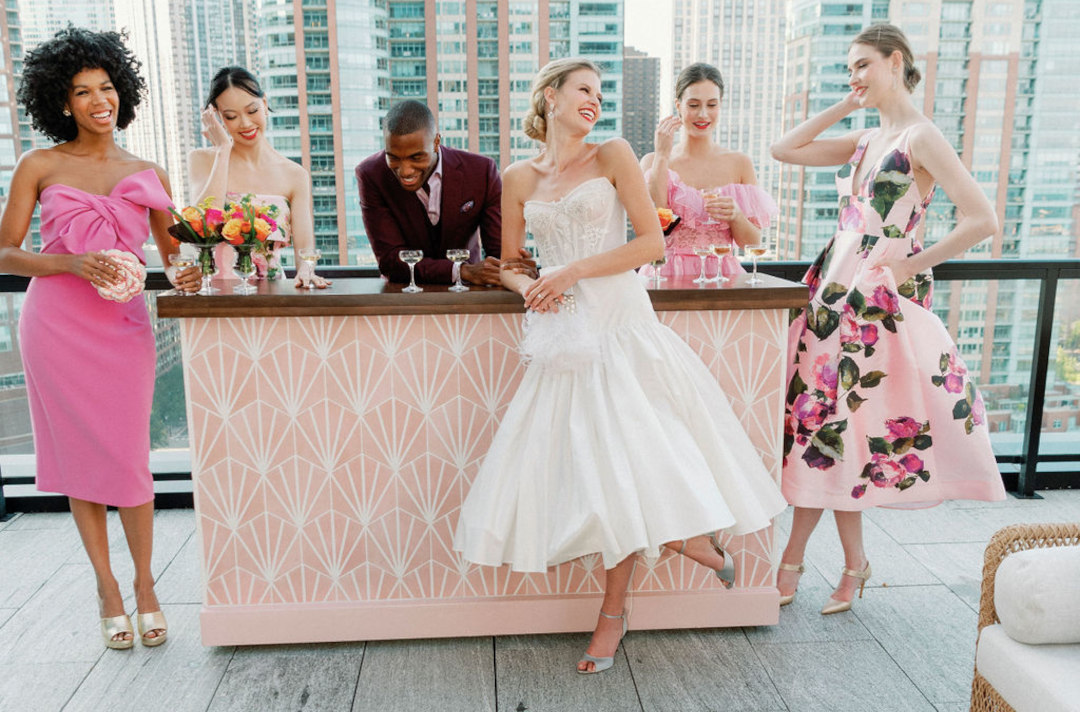 Styled Shoot Models on St, Regis Chicago Rooftop posing for a Wedding Cocktail Hour with Bar setup